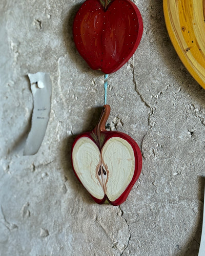 Mela a metà